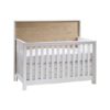 Vibe white crib with natural oak wood headboard